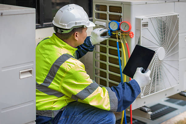 Professional Hvac technician working in Piedmont, AL